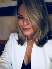 Lisa Marie Bourke white coat black shirt